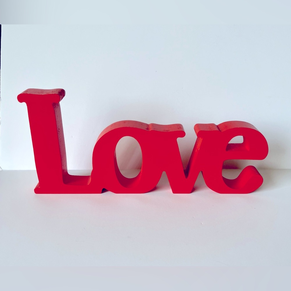 LOVE sign. 11” wide. Overall good condition.